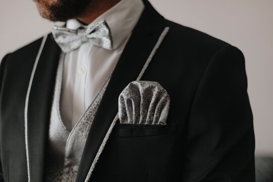 Elegant gentleman in tuxedo with pocket square