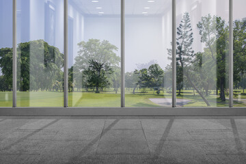 Empty room with window glass and green grass with trees