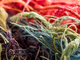 Swirl of colorful cotton fabric strands
