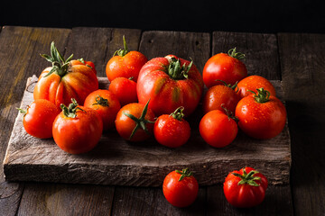 Delicious red tomatoes  full of organic. Fresh tomatoes, It can be used as background. Realfood.