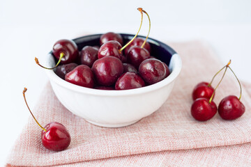  Bowl of ripe cherries. Selrctive focus. Close up.