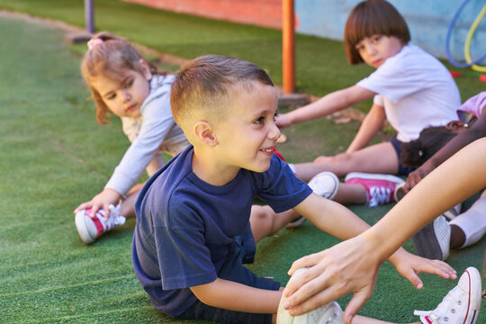 Children Have Fun Doing Gymnastics In Physical Education Class