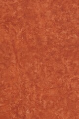 Brown paint textured background with space for text,  Vertical decorative backdrop, blank dark color paper, abstract card template, and aged wallpaper style.