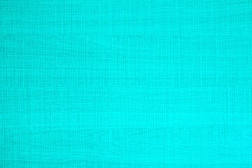 Turquoise background with textured surface and grungy background. Blank horizontal image for backdrop, light color poster, text, simple decoration, paper, etc.