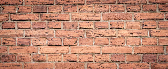 red brick with visible details. background or texture