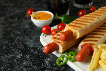 Concept of tasty food with french hot dog