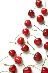 Obraz na płótnie Canvas Sweet red cherry berries on white background