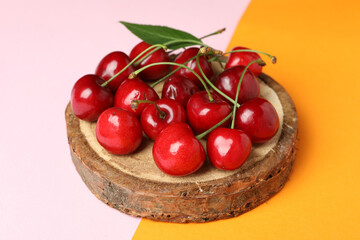 Concept of sweet berry with red cherry