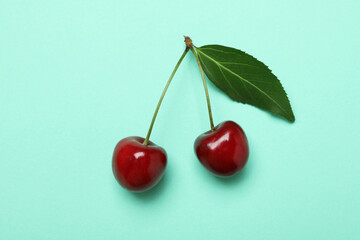 Concept of sweet berry with red cherry