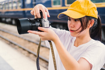 Portrait of a beautiful teenager girl making photo with camera, 