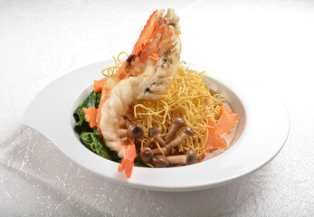 stir fried big tiger prawn with crispy noodle mee and vegetables in thick gravy sauce asian halal menu