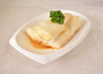steamed rice vermicelli noodle roll wrapped with char siew prawn meat in salted soy sauce Cee...