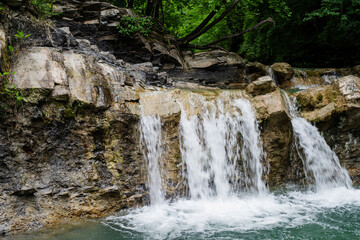 Fototapeta na wymiar Beautiful tropical waterfall