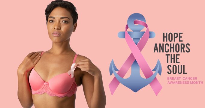 Composition of pink ribbon anchor logo and breast cancer text, with smiling woman in pink bra