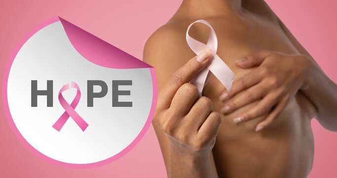 Composition of pink ribbon anchor logo and hope text, with woman covering bust with hands