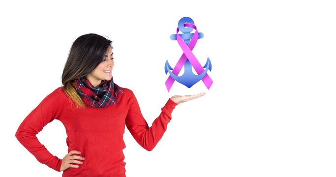 Composition of young smiling woman with pink ribbon anchor logo on white background