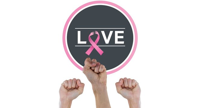 Composition of pink ribbon logo and love text, with raised fists on white background
