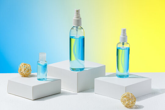 Different types of sanitizer to protect yourself from coronavirus or flu disease. Blue color hygiene sprays without logo for advertisement.