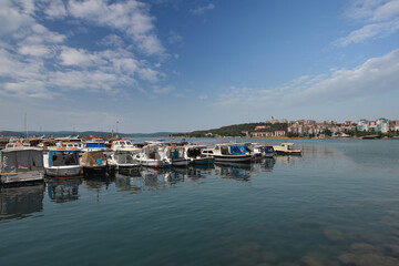 Fototapeta na wymiar Turkey - Boats in the sea on the coast of Çanakkale