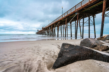 Amazing natural landscape with Oceanside Fishing Pier is located in California on a cloudy day....