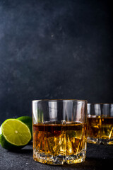 Whiskey with ice in glasses