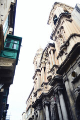 Fototapeta na wymiar MALTA, VALETTA: Scenic cityscape view of the streets with old buildings 