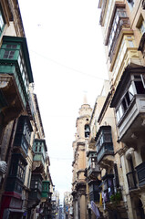 Fototapeta premium MALTA, VALETTA: Scenic cityscape view of the streets with old buildings 