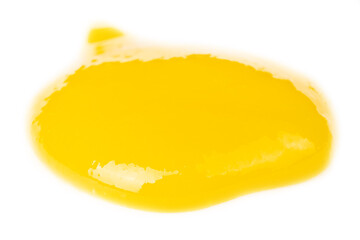 yellow drop of medical marijuana concentrate, cannabis wax isolated close up