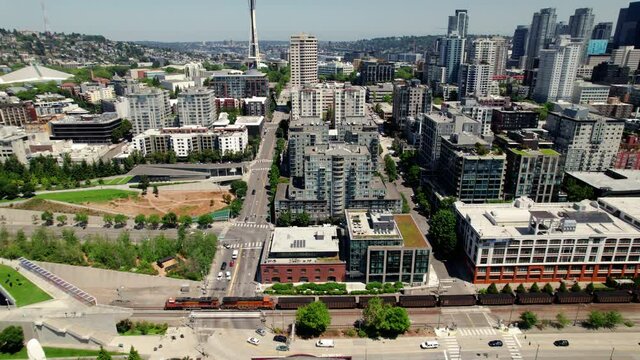 Amazing Aerial Following Coal Train Panning Up to Reveal Seattle City Skyline