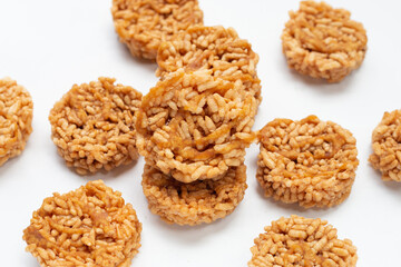 Rice cracker with coconut palm sugar on white