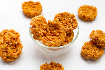 Rice cracker with coconut palm sugar on white