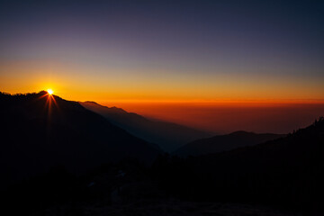 Fototapeta na wymiar bright sunrise in the Himalayan mountains, Annapurna region
