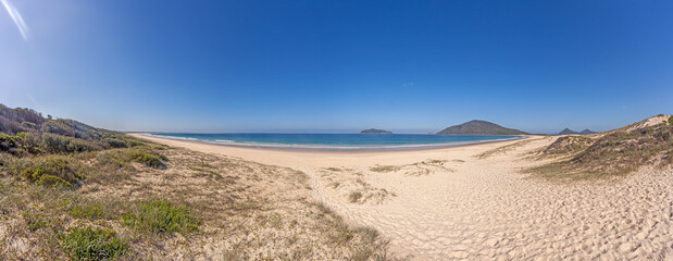 Fototapeta na wymiar Panorama over a paradisiacal beach on the Australian Golden Coast in the state of Queensland