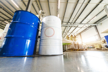 The interior of a factory for the production of polypropylene products from recycled materials. Mixing barrels and special equipment