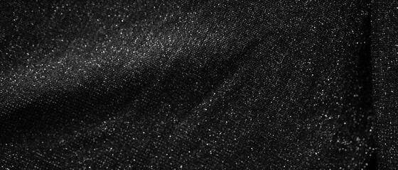 Glittering fashion black background with twinkling grainy texture