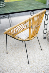 Close-up of garden chairs made of natural materials outdoors