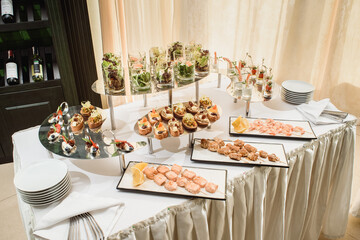 Beautiful catering banquet buffet table. Banquet service. High quality photo