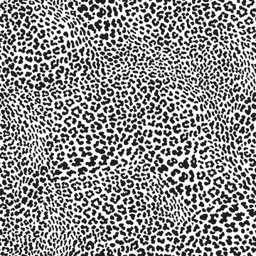 Vector animalistic seamless pattern from leopard skin spots.
 Trendy black and white background. Batik, wallpaper, wrapping paper, silk chintz textile print
