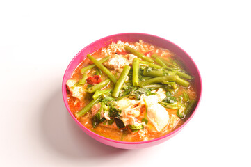 Spicy soup curry instant noodles isolated on white background. Selective focus