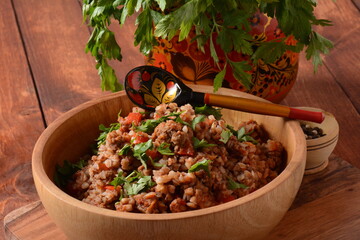 Buckwheat porridge with beef meat and vegetables. Russian cuisine