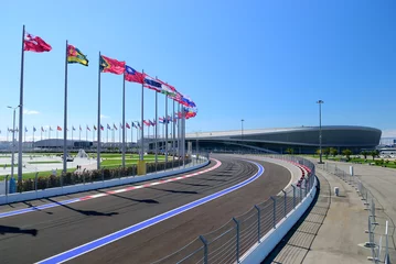 Fotobehang Formule 1 Part of Sochi Autodrom with Flags different countries  © Arestov Andrew