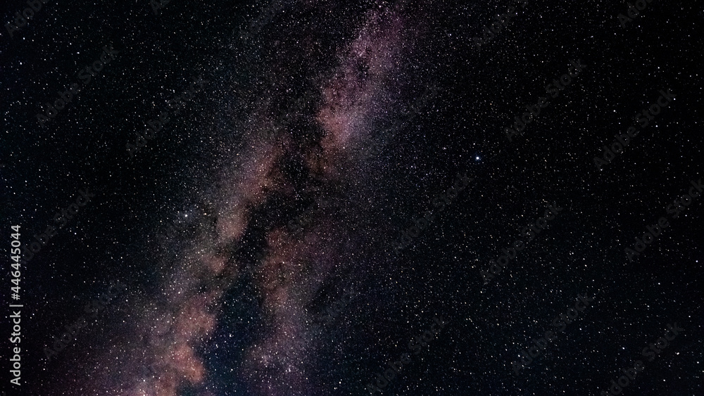 Wall mural milky way in the night sky