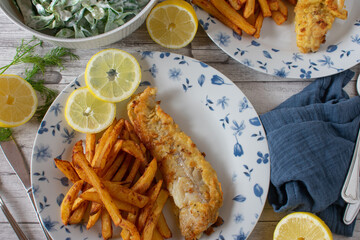 fish with french fries and salad
