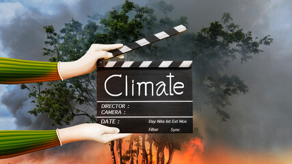 Hands holding film slate or movie clapper board on fire forest, climate change concept.