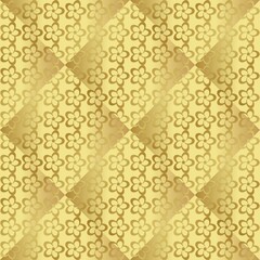 Gold paper for printing.  Seamless pattern. Gold background with decor. Imitation metal foil.