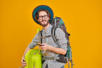 joyful tourist with luggage