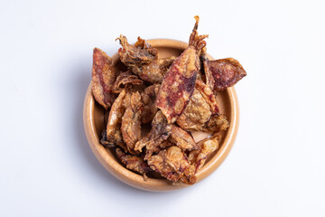fried squid in a wooden cup on a white background