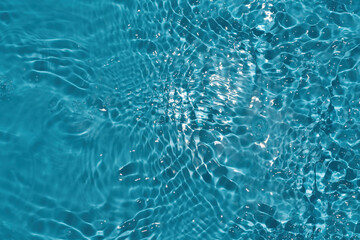 Water waves in sunlight with copy space. Abstract nature background blue water with waves