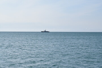 The ship is on the horizon. Black Sea. Beautiful seascape.