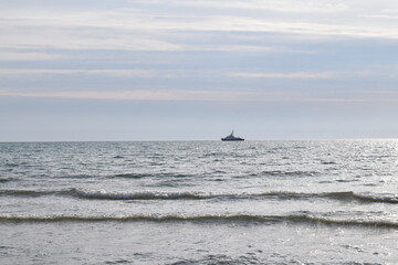 The ship is on the horizon. Black Sea. Beautiful seascape.
